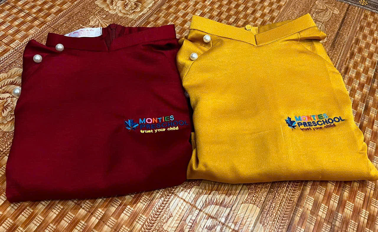 áo dài lễ tân spa